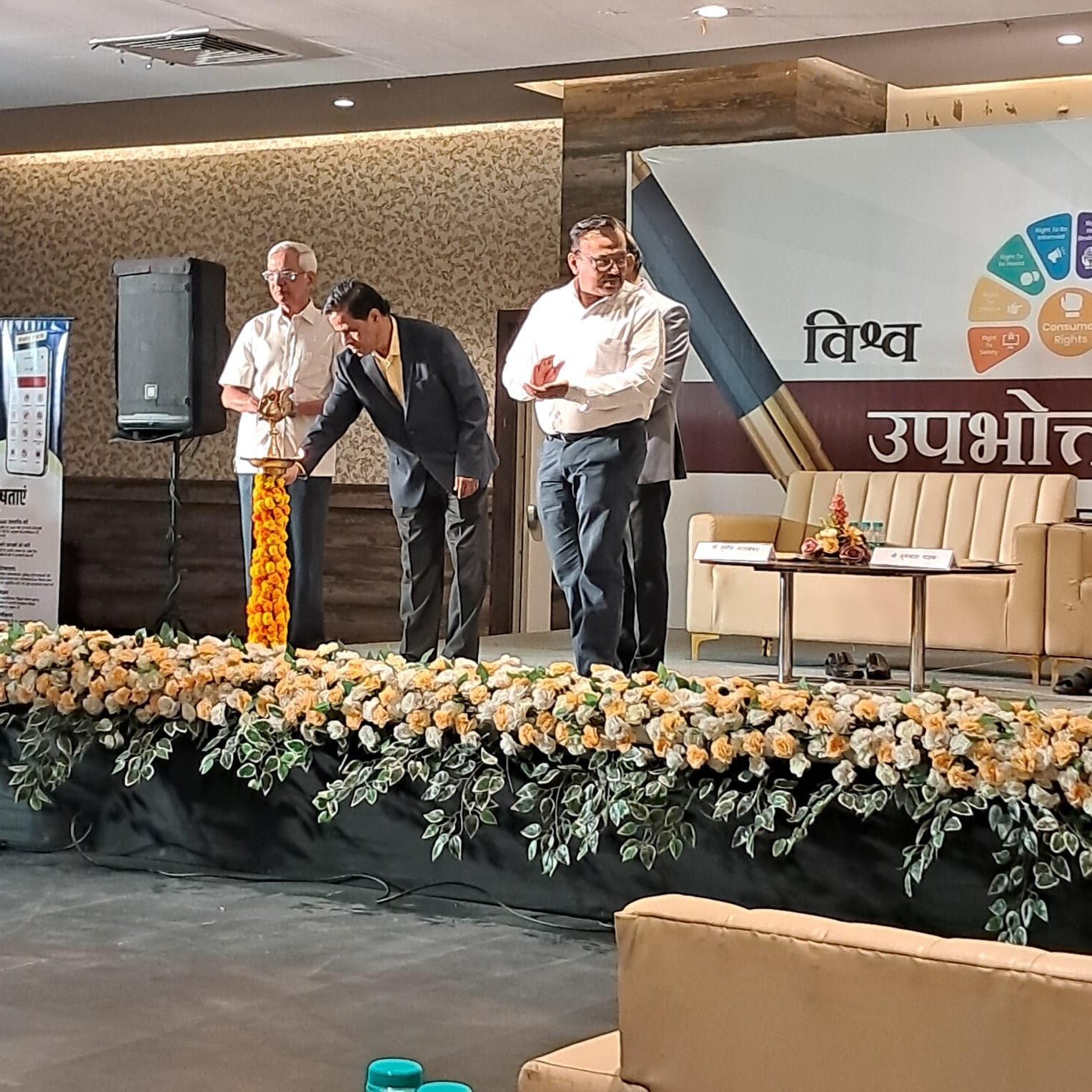 Lighting the lamp at the World Consumer Rights Day programme